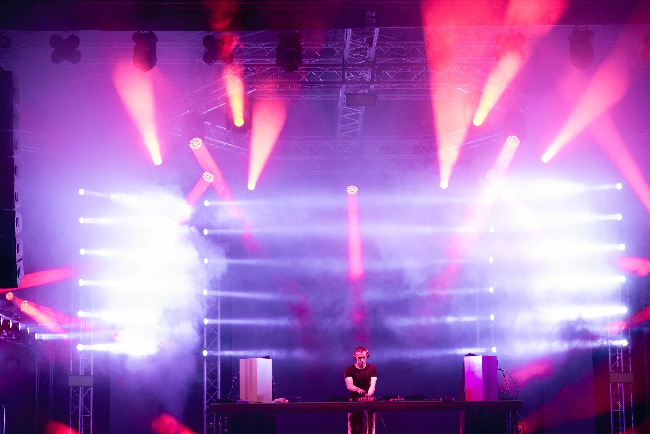 Crowd at electronic music festival with stage lights