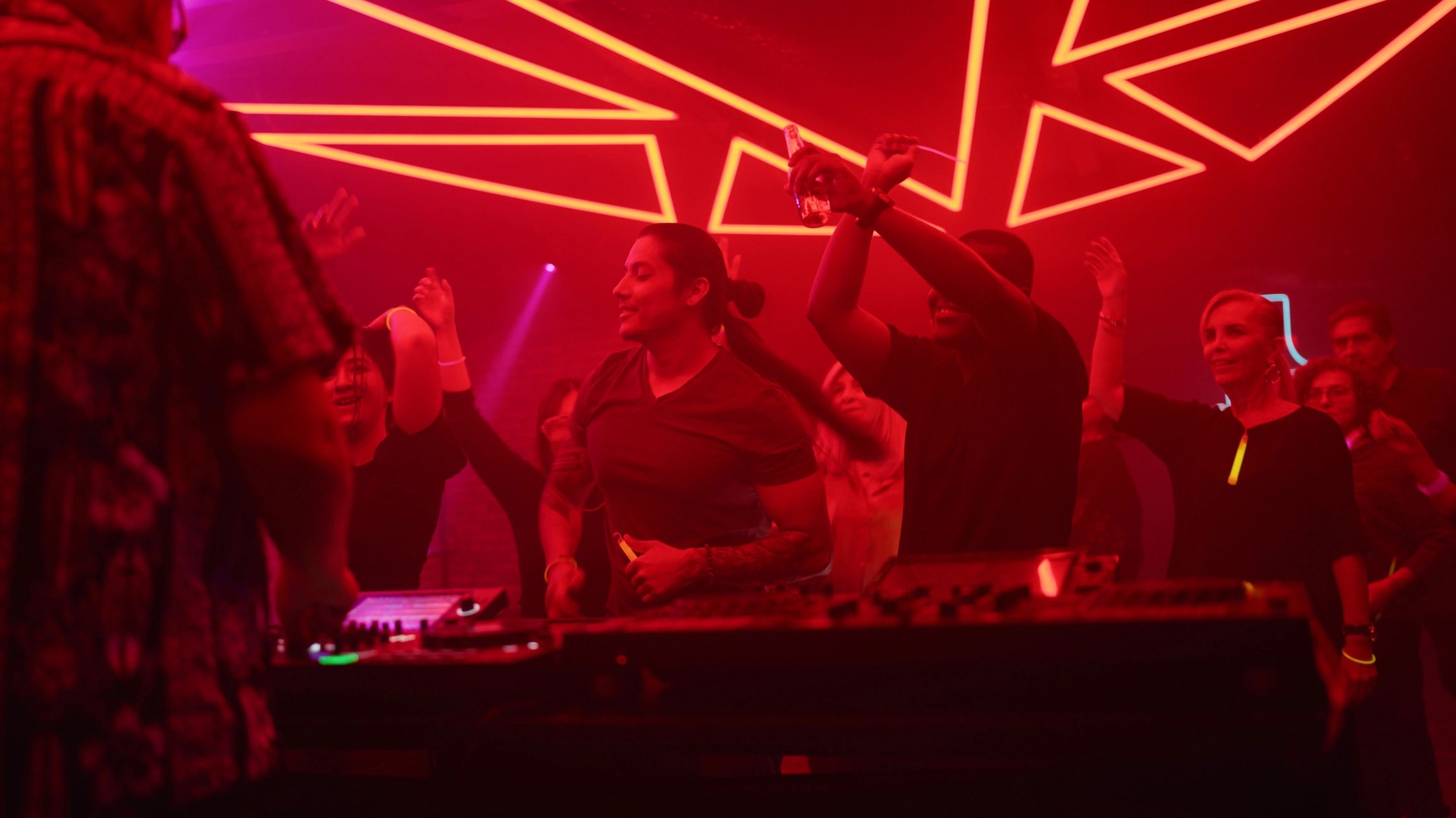 DJ set at a neon-lit club